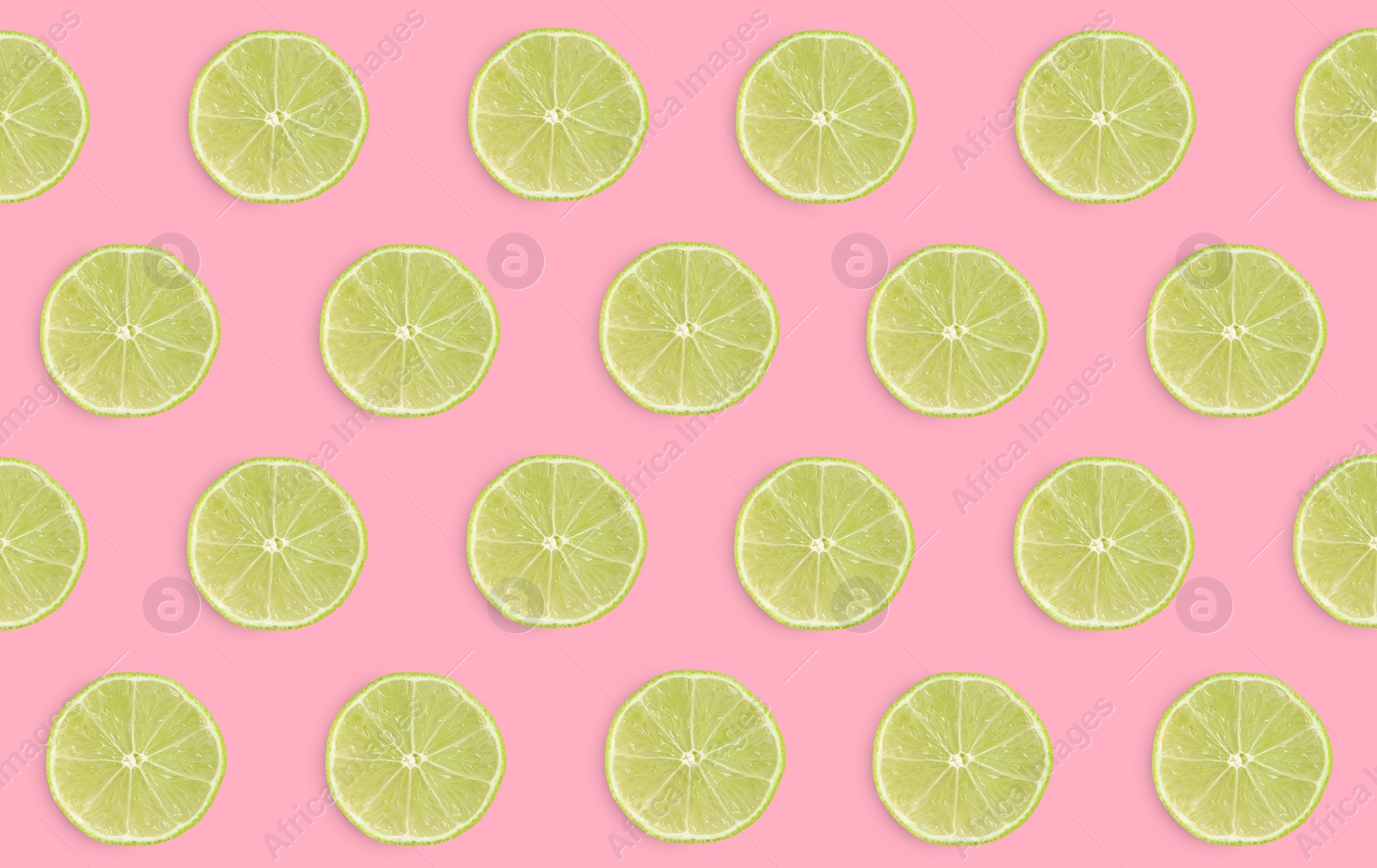 Image of Slices of limes on pink background, flat lay