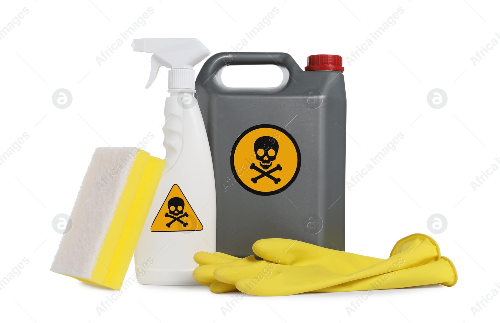 Photo of Bottles of toxic household chemicals with warning signs, rubber gloves and scouring sponge on white background