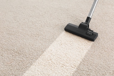 Vacuum cleaner on carpet