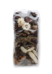 Scented sachet with mixed dried flowers on white background