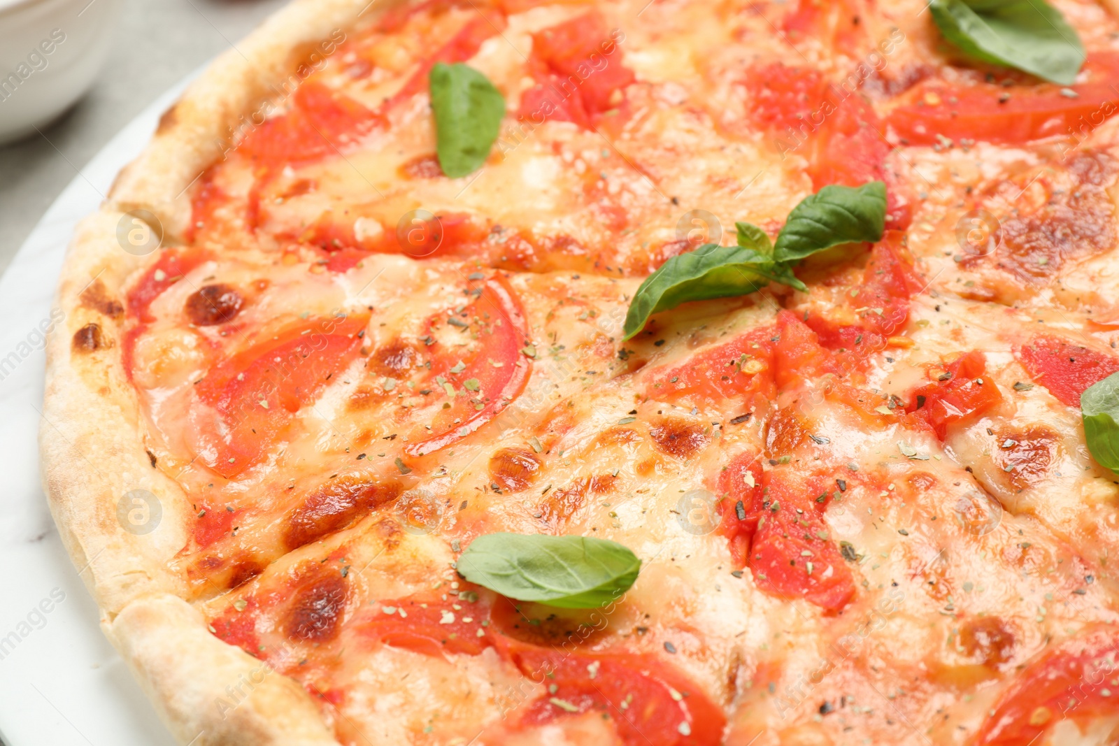 Photo of Delicious pizza Margherita on table, closeup view