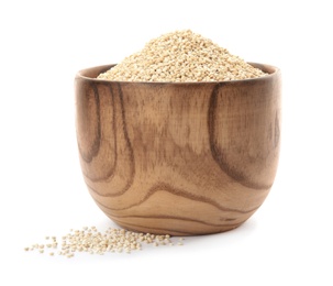 Bowl with raw quinoa on white background