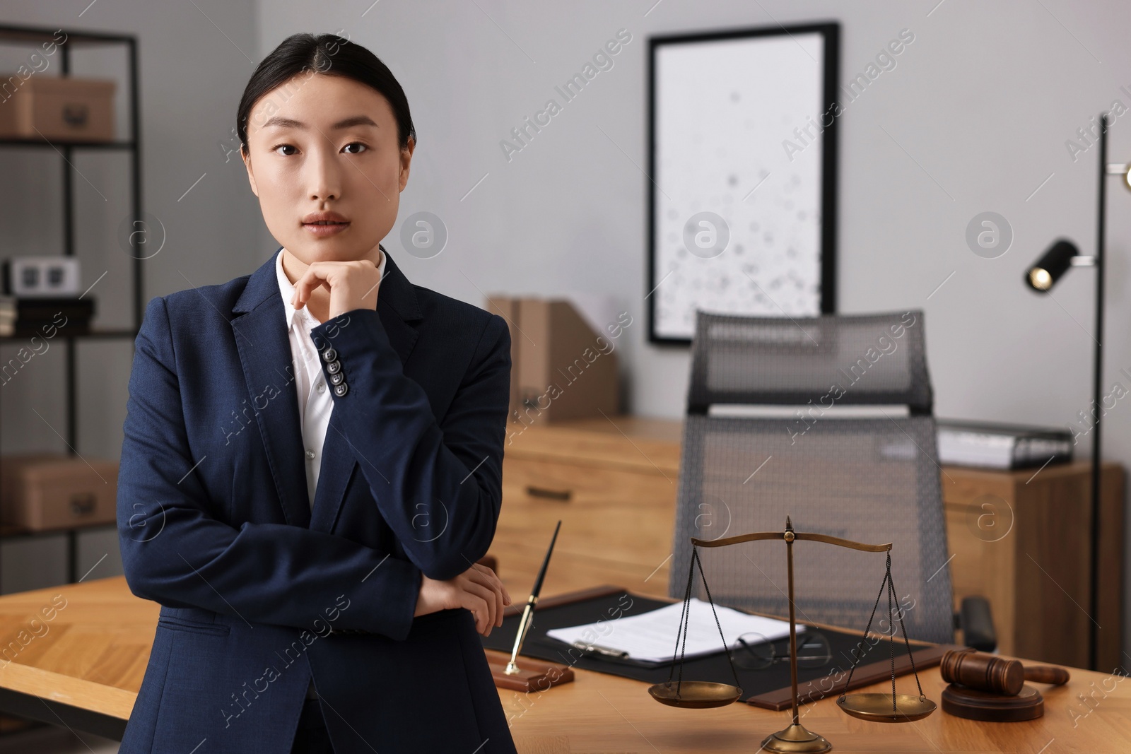 Photo of Portrait of notary in office. Space for text