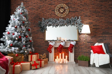 Stylish room interior with beautiful Christmas tree