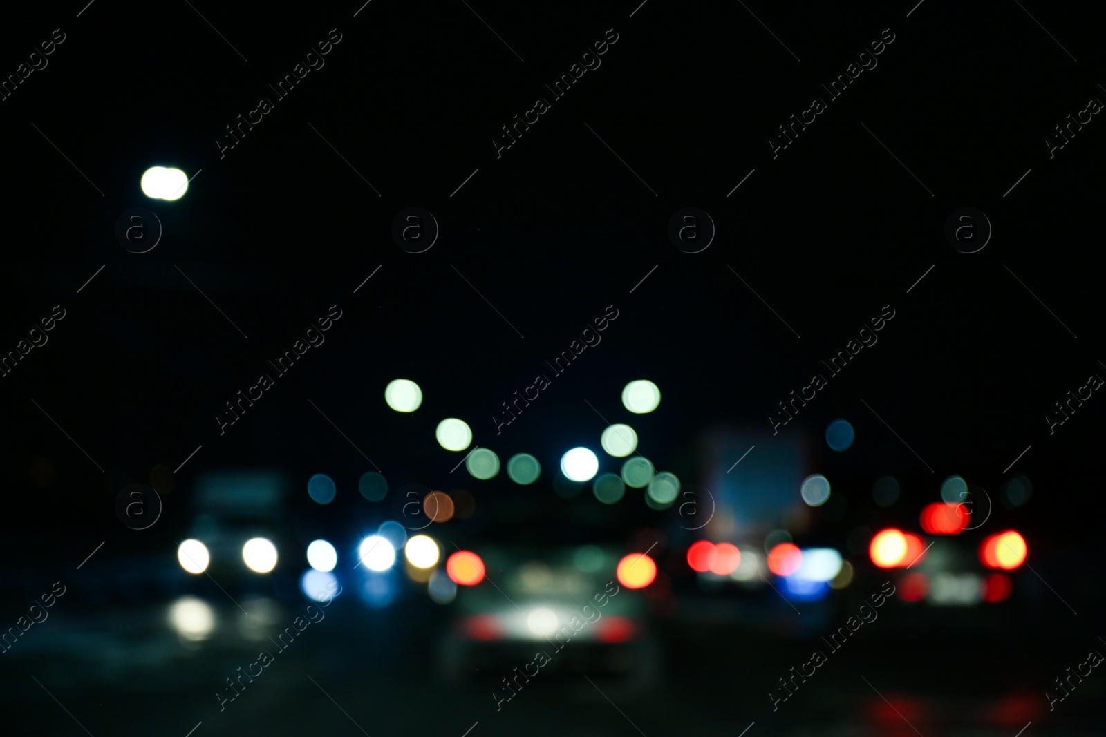 Photo of Blurred view of city at night. Bokeh effect