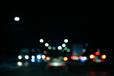 Photo of Blurred view of city at night. Bokeh effect