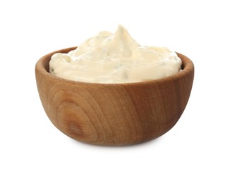 Tartar sauce in wooden bowl isolated on white