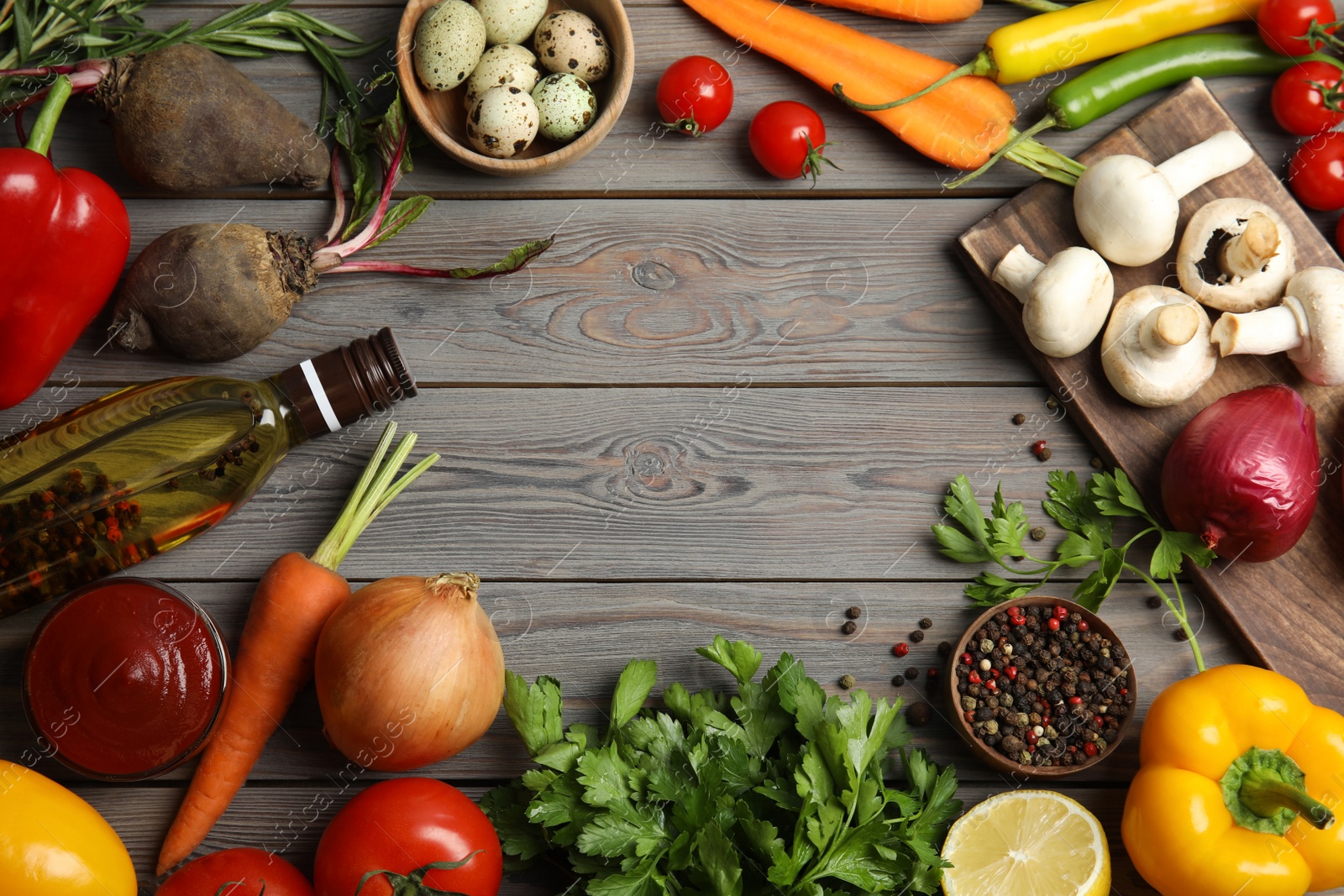 Photo of Frame of ingredients for cooking on wooden table, flat lay. Space for text