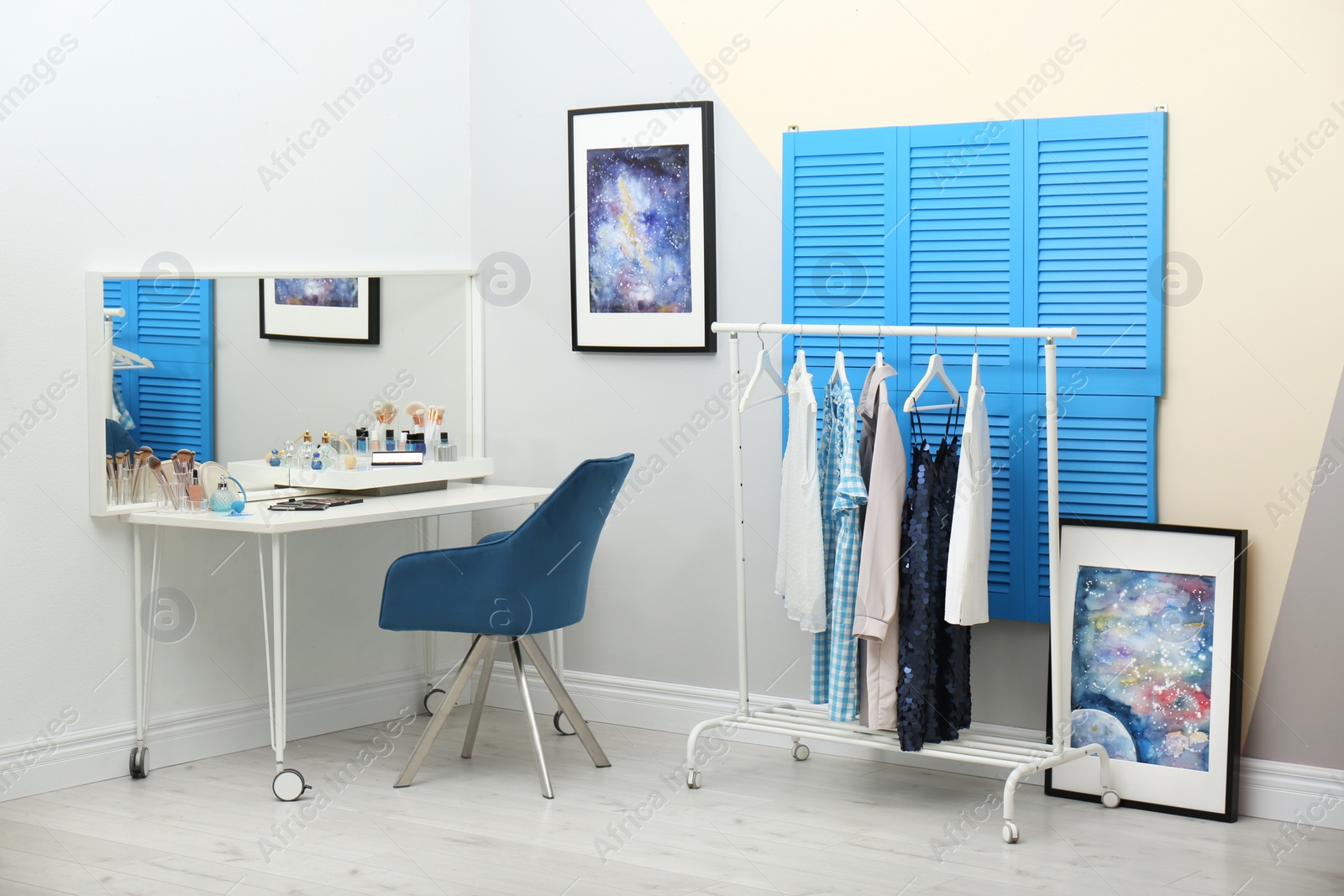 Photo of Elegant dressing room interior with makeup table