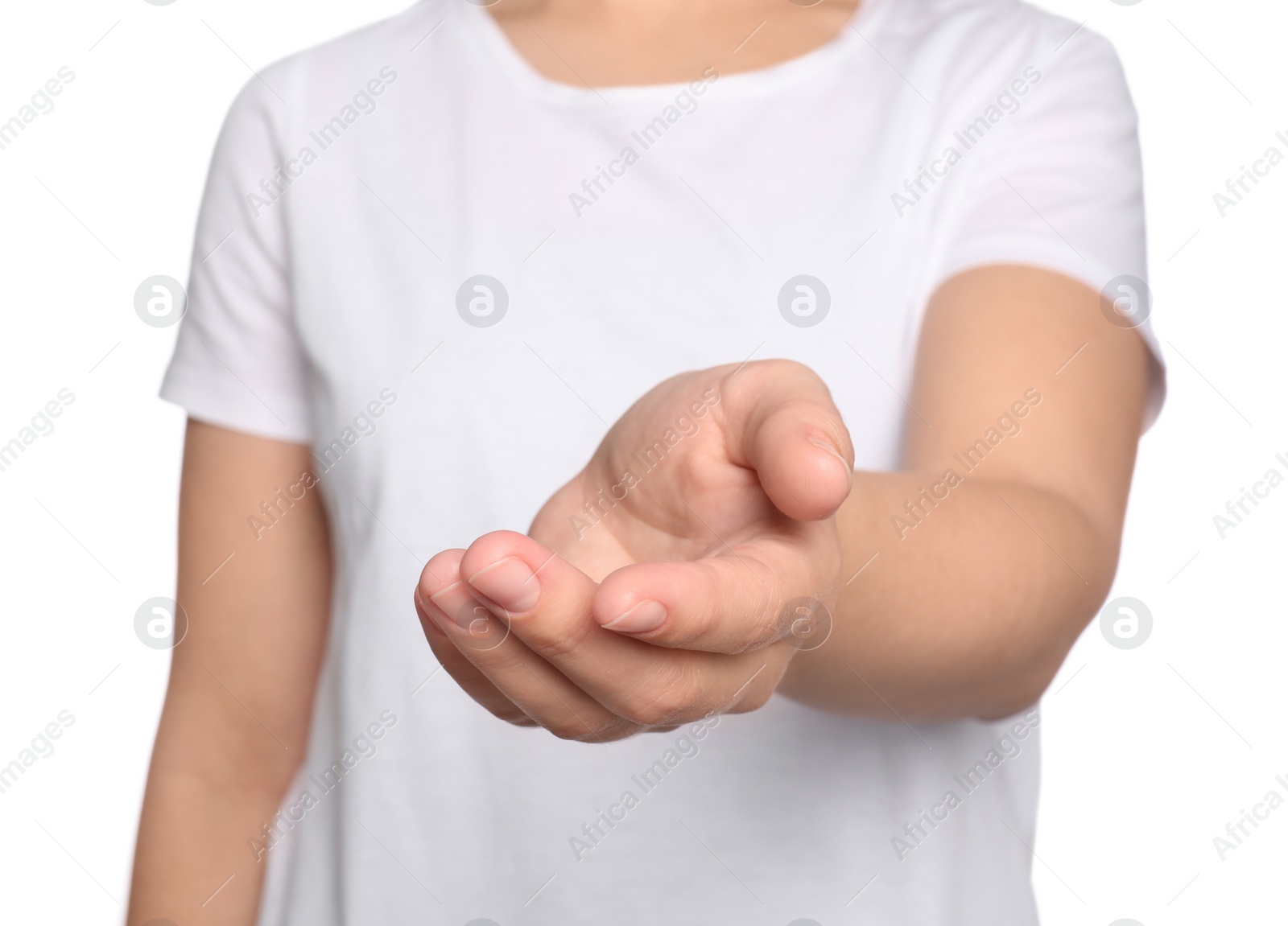 Photo of Woman against white background, closeup on hand