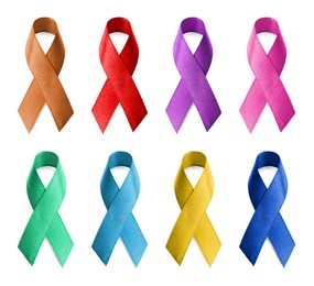 Image of Set with different color ribbons on white background. World Cancer Day