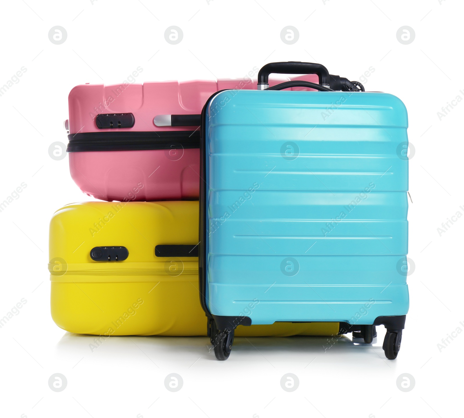 Photo of Modern suitcases for travelling on white background