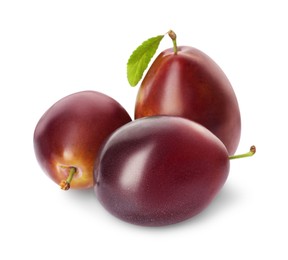 Delicious fresh ripe plums on white background