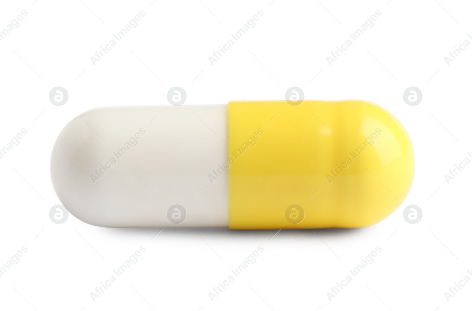 Photo of One pill on white background. Medicinal treatment