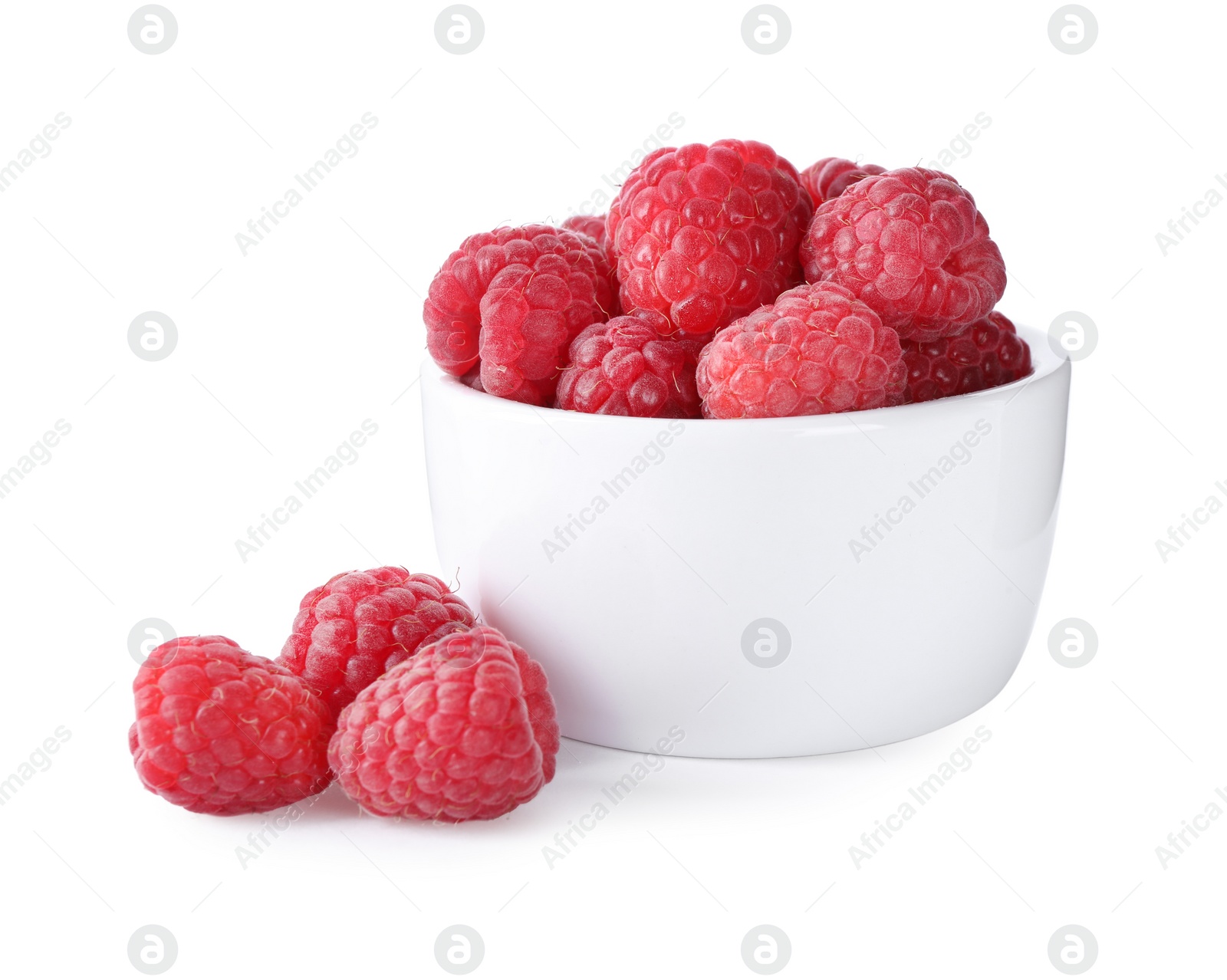 Photo of Delicious fresh ripe raspberries in bowl isolated on white