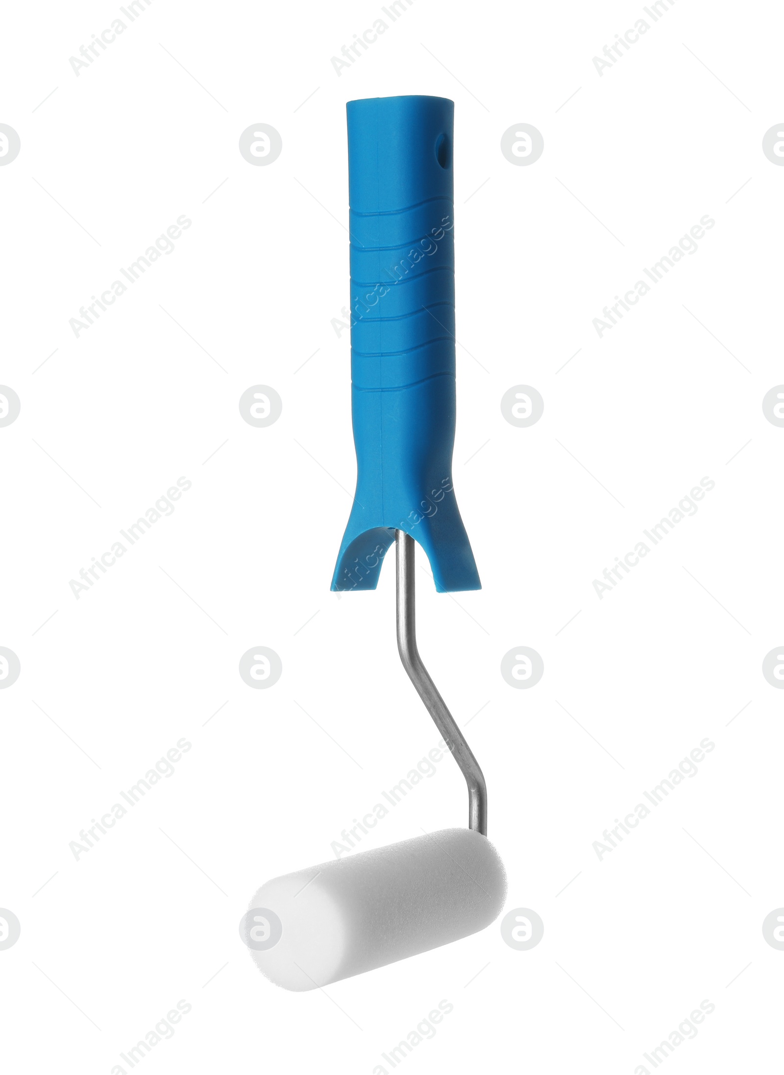 Photo of New paint roller brush on white background