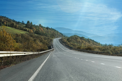 Road trip. Beautiful view of asphalt highway on sunny day 