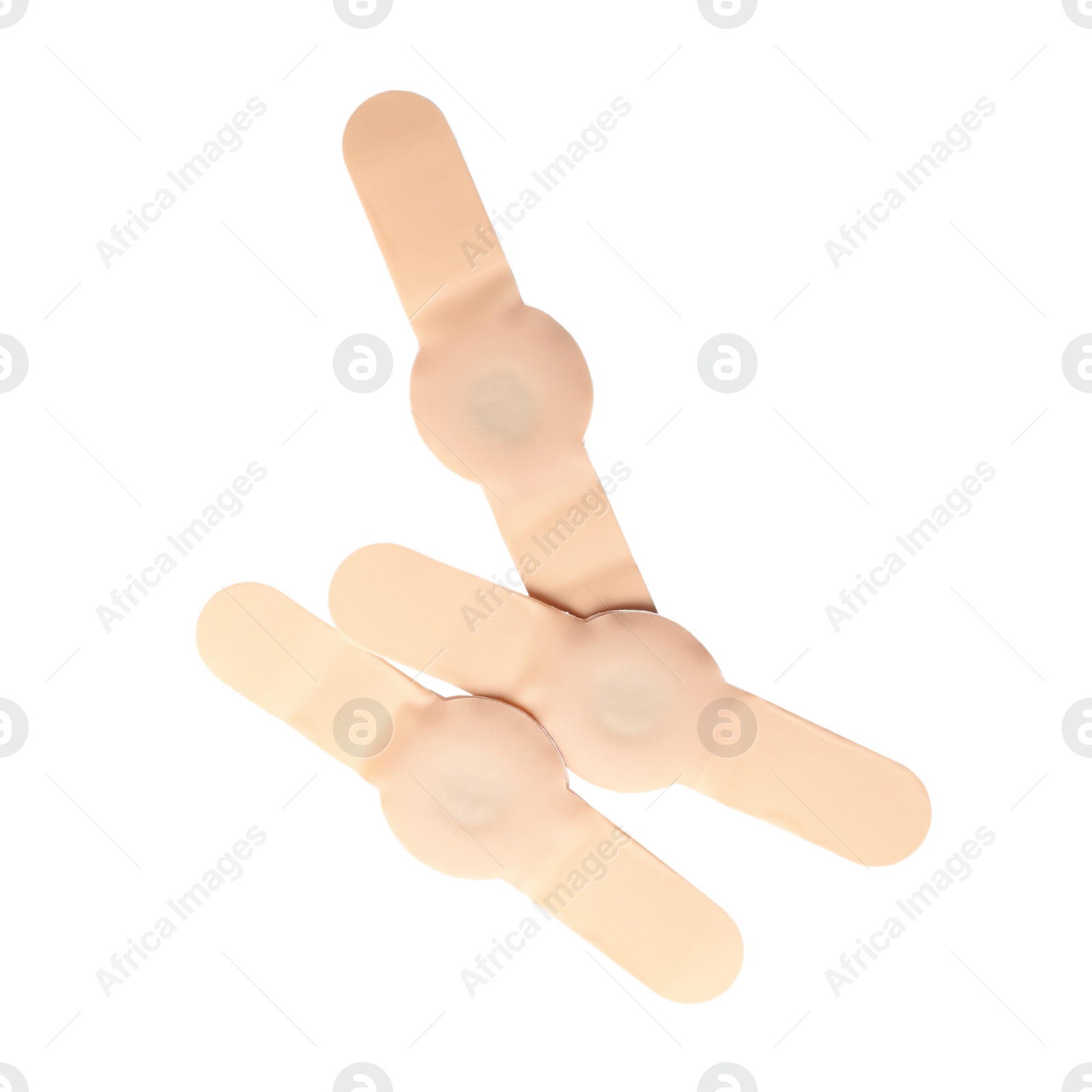Medical sticking plasters isolated on white. First aid item Photo of Medical sticking plasters isolated on white. First aid item