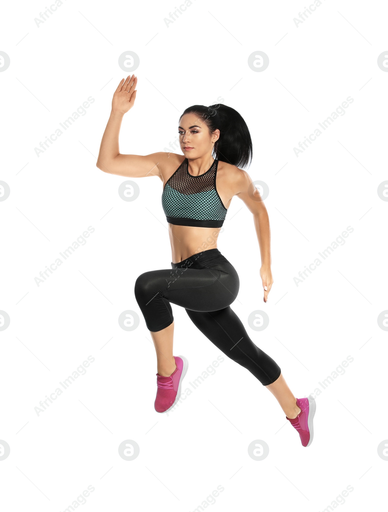 Photo of Sporty young woman running on white background