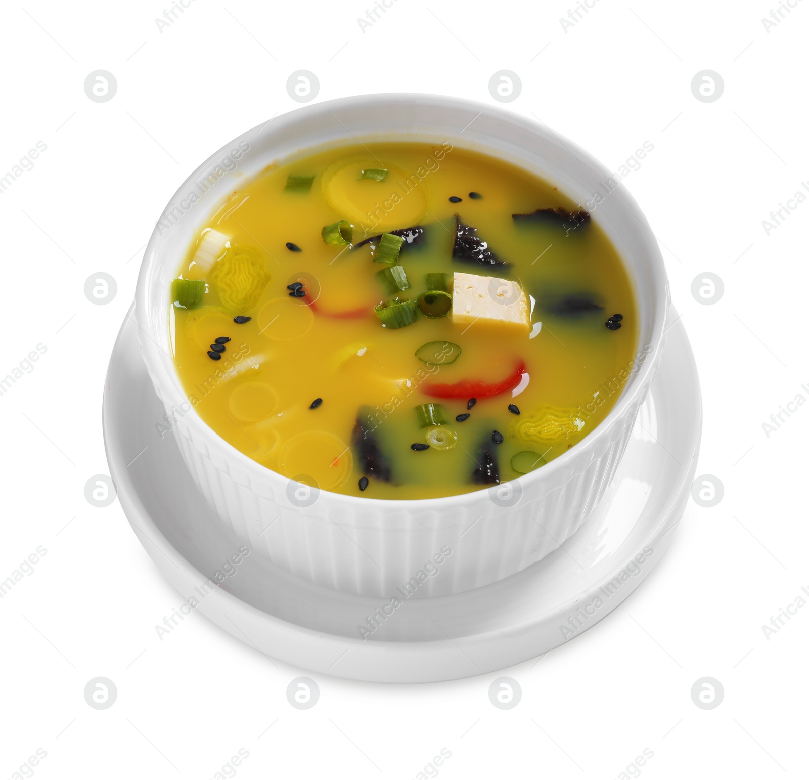 Photo of Bowl of delicious miso soup with tofu isolated on white