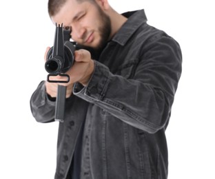 Photo of Assault gun. Man aiming rifle against white background, focus on muzzle