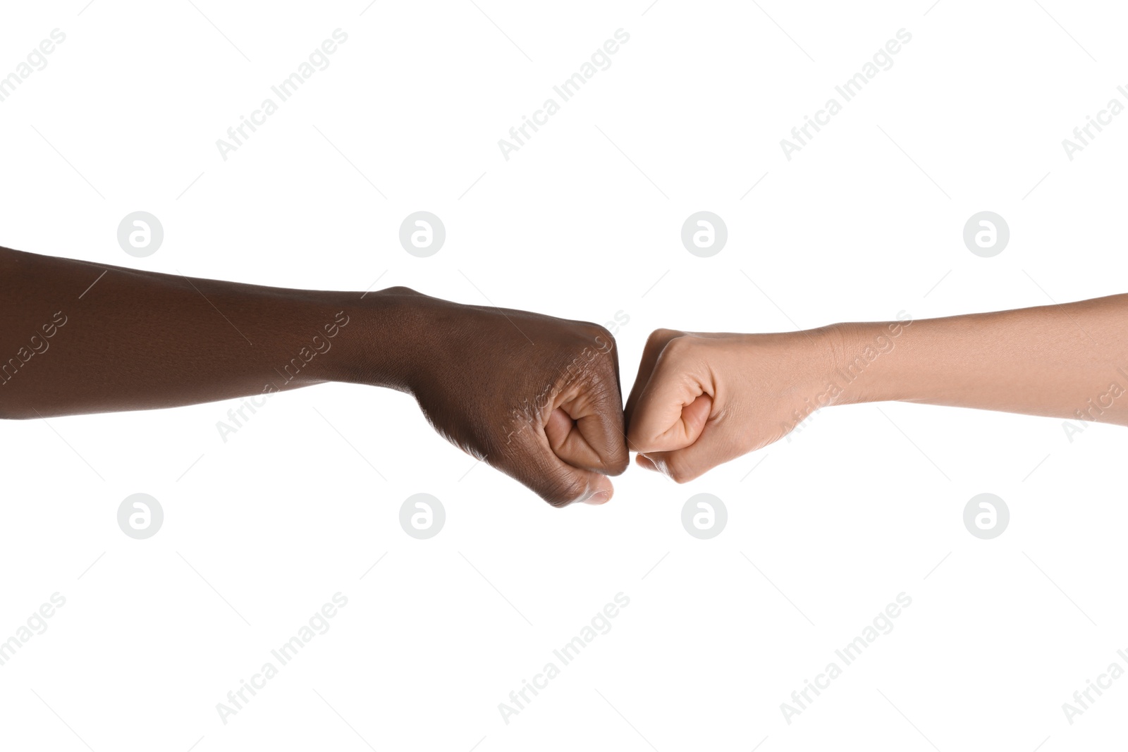 Photo of Woman and African American man making fist bump on white background, closeup