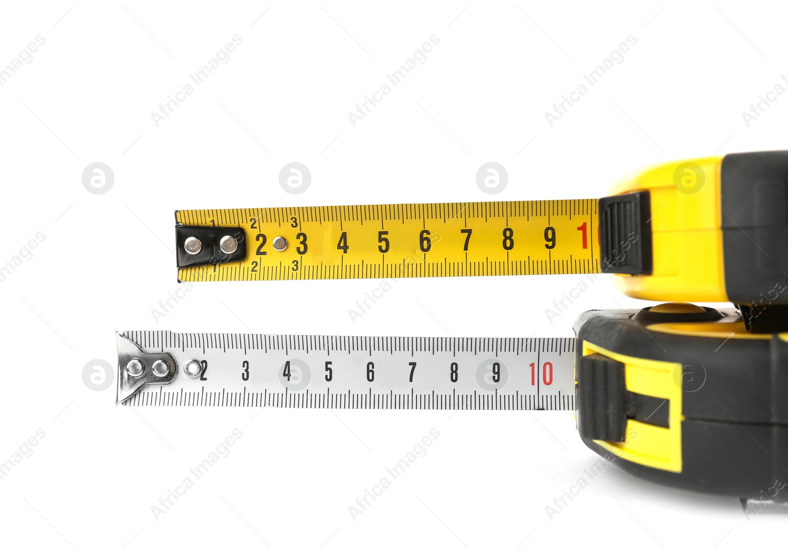 Photo of Measuring tapes on white background