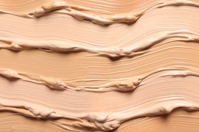 Samples of skin foundation as background, closeup