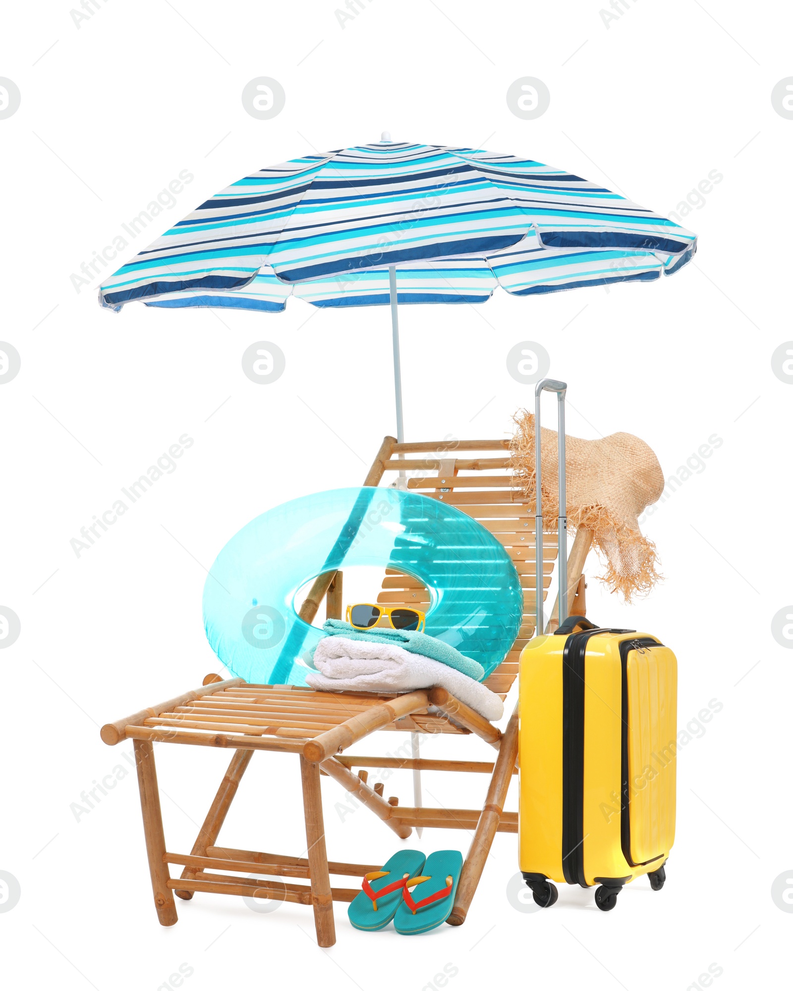 Deck chair, umbrella, suitcase and beach accessories isolated on white Photo of Deck chair, umbrella, suitcase and beach accessories isolated on white
