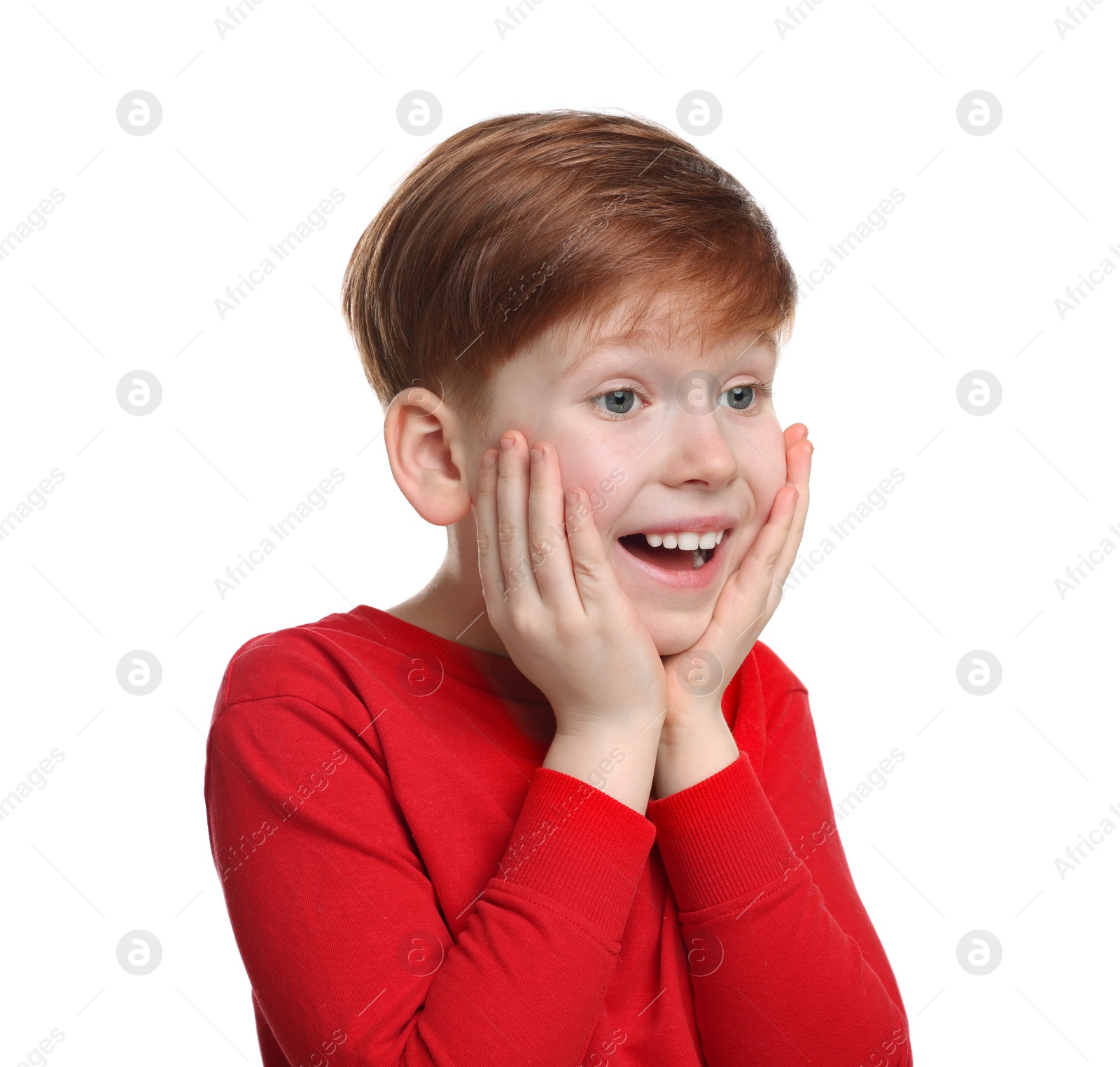 Photo of Portrait of surprised little boy on white background