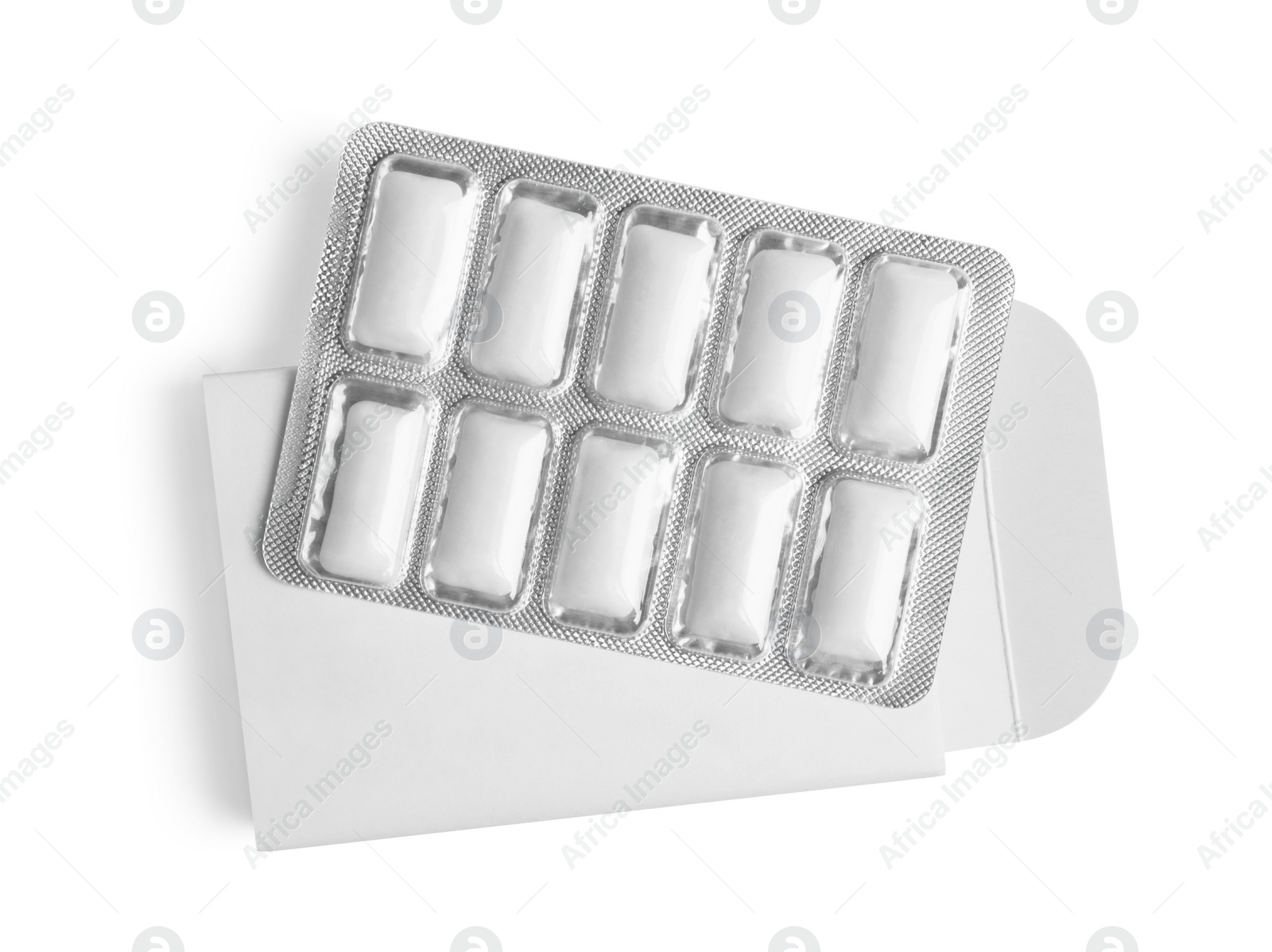 Photo of Pack and blister with chewing gums isolated on white, top view