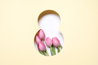 Photo of 8 March greeting card design with tulips, top view. Happy International Women's Day