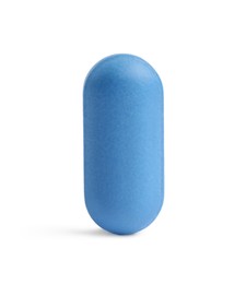 One blue pill on white background. Medicinal treatment