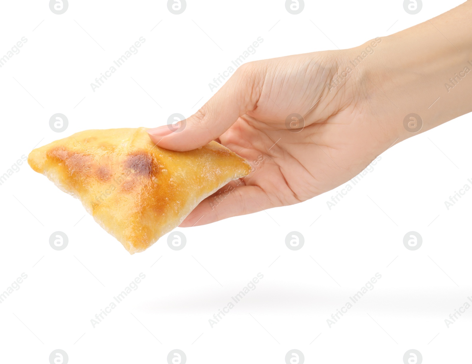 Photo of Woman holding delicious samosa on white background, closeup