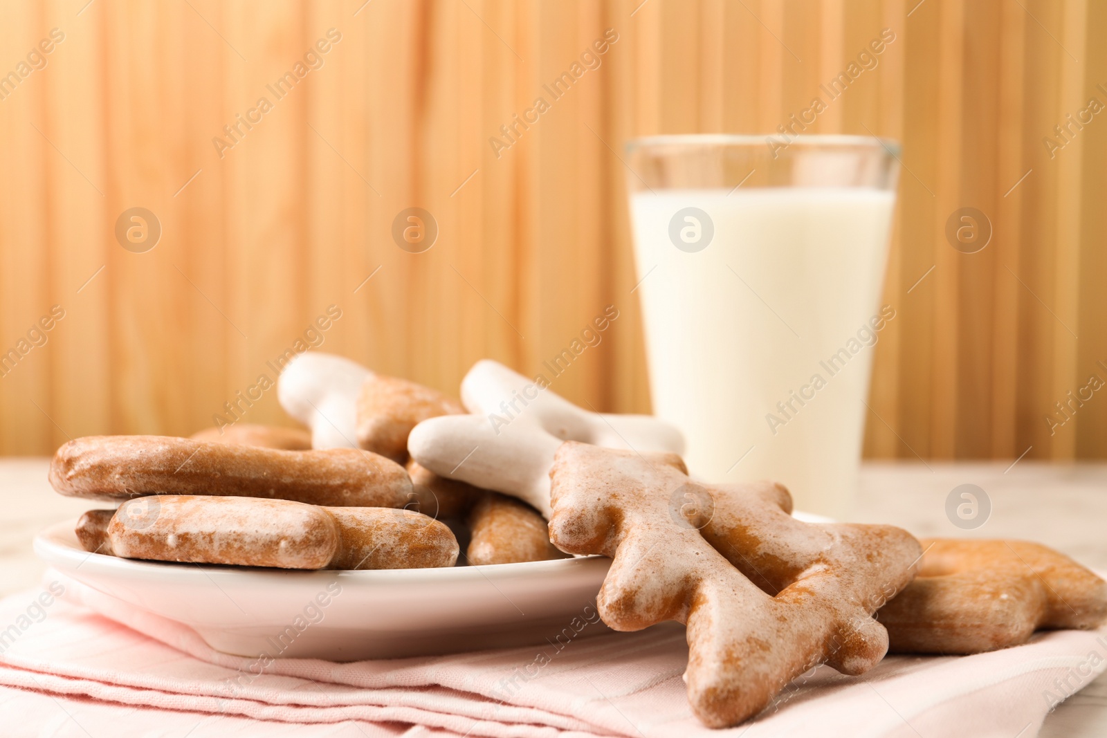 Photo of Sweet delicious cookies and milk on table