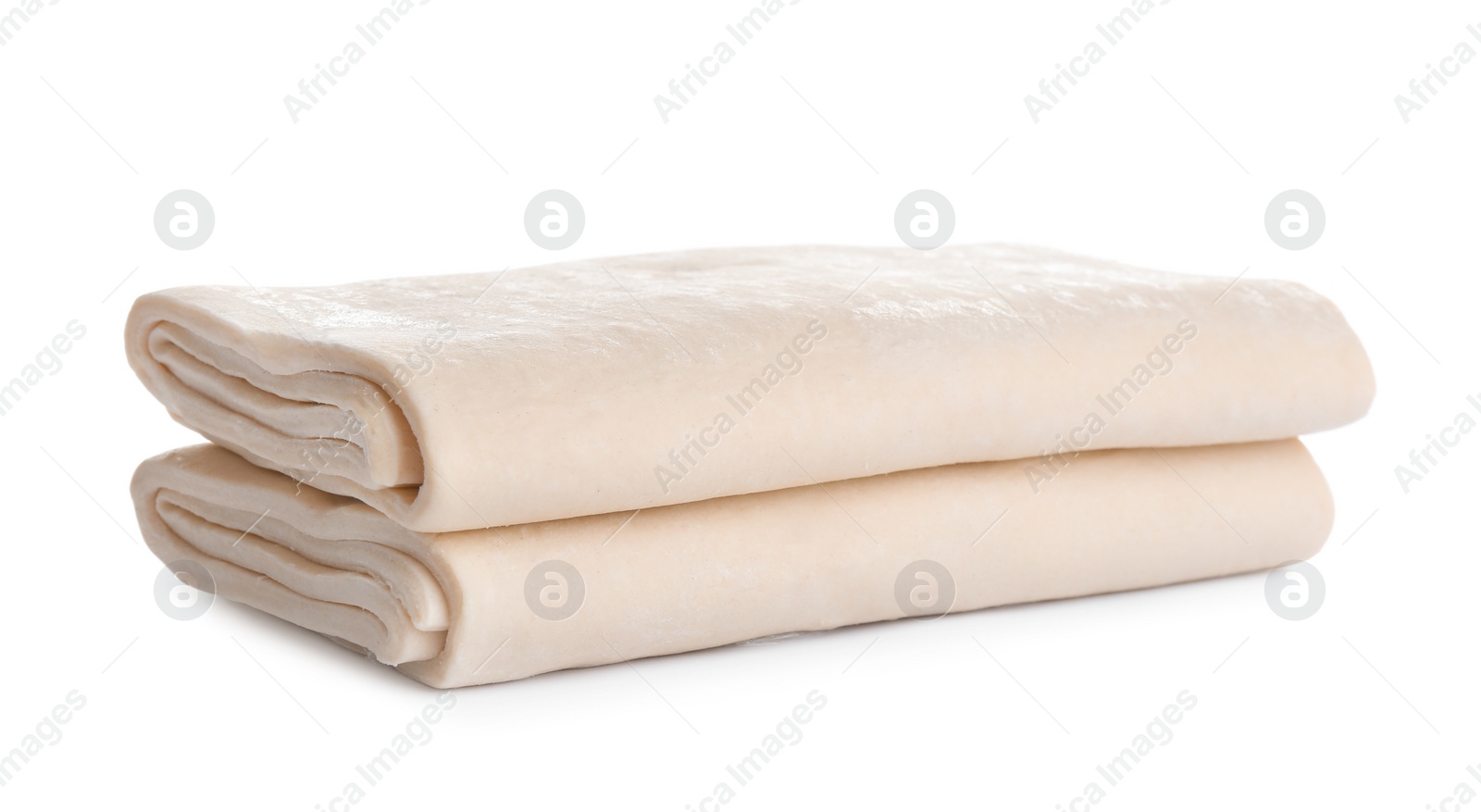 Photo of Fresh dough on white background. Puff pastry