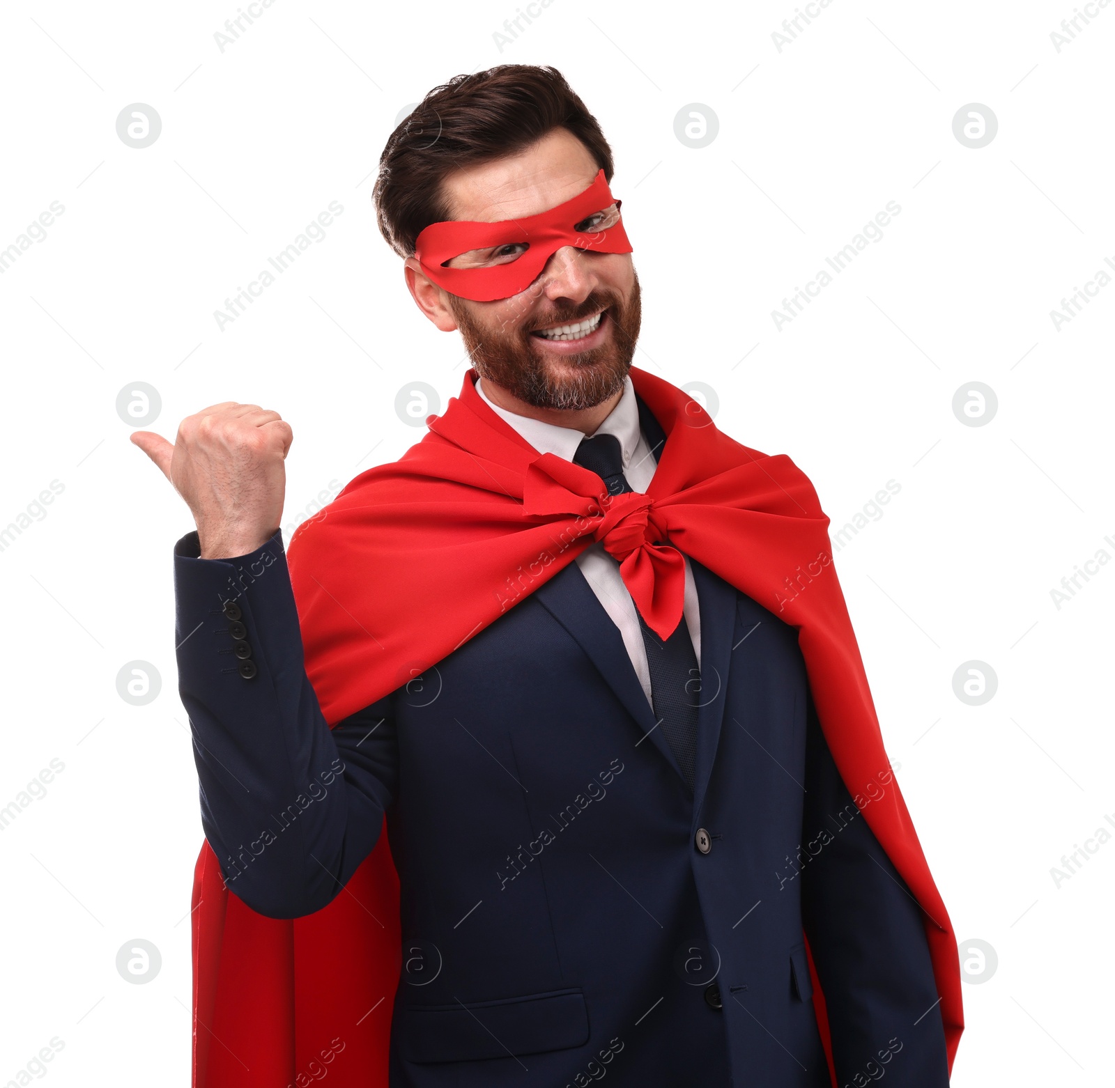 Photo of Happy businessman wearing red superhero cape and mask on white background