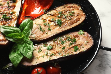 Grill pan of fried eggplants, closeup view