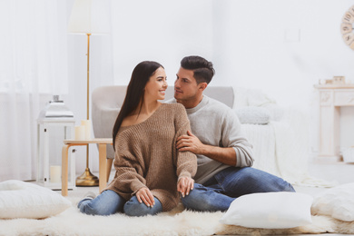 Happy couple spending time together at home. Winter vacation