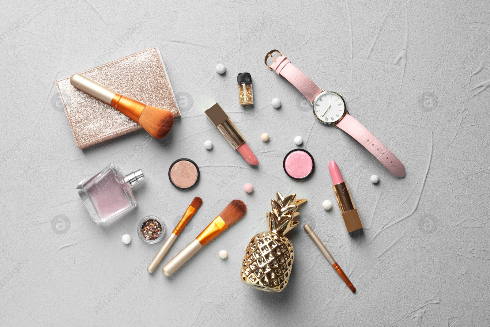 Photo of Flat lay composition with decorative cosmetics on gray background