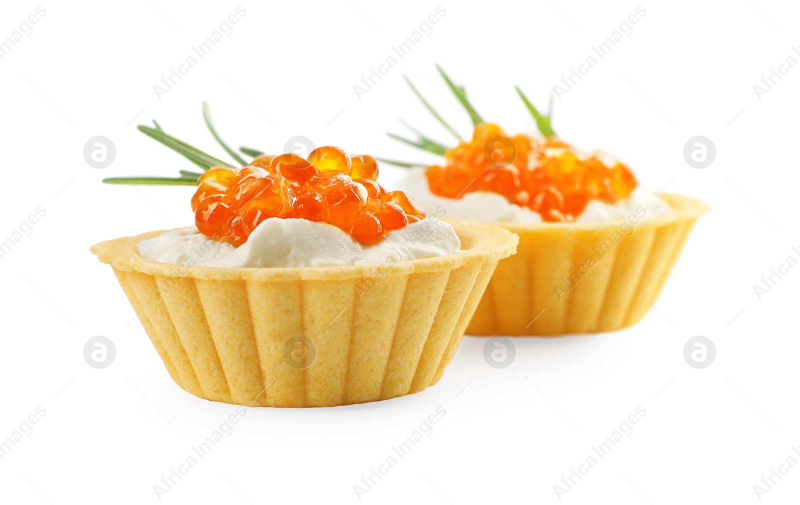 Photo of Delicious tartlets with red caviar and cream cheese on white background