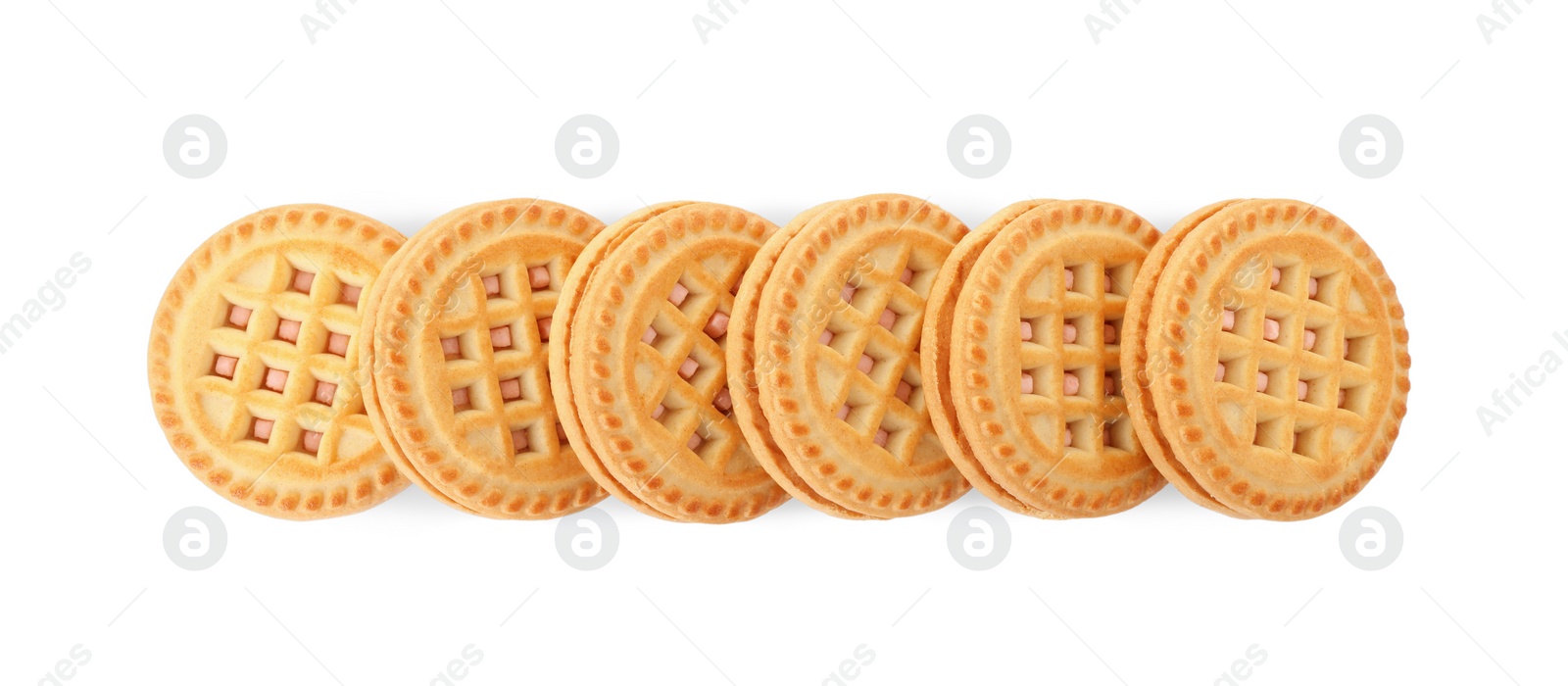 Photo of Tasty sandwich cookies with cream isolated on white, top view