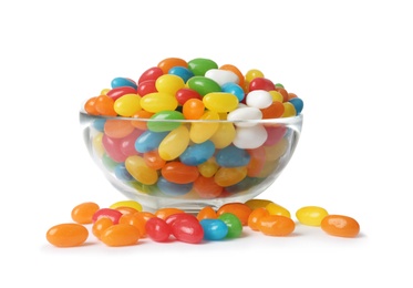 Photo of Glass bowl with tasty bright jelly beans isolated on white