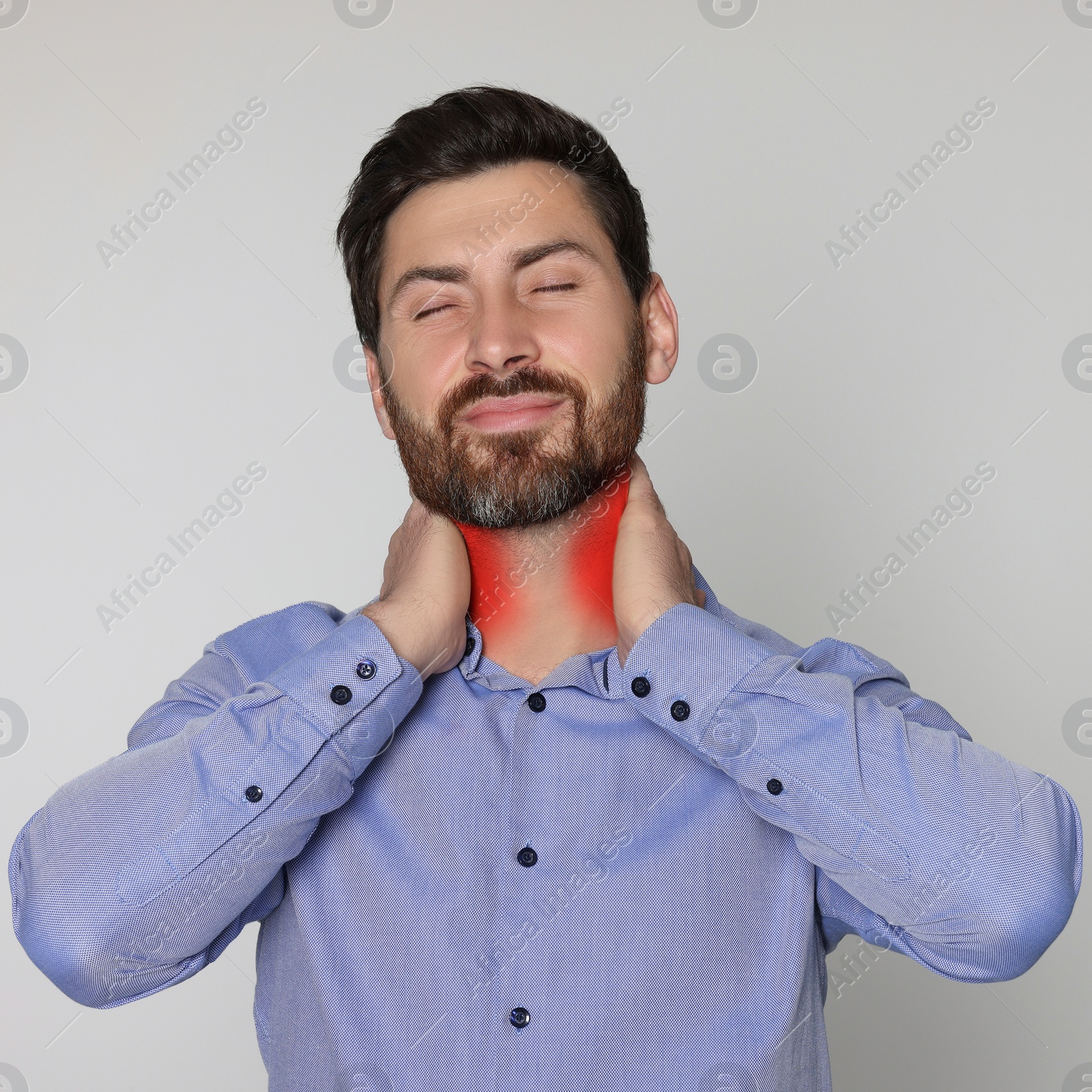 Image of Man suffering from rheumatism on light background