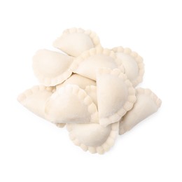 Photo of Heap of raw dumplings (varenyky) with tasty filling on white background, top view