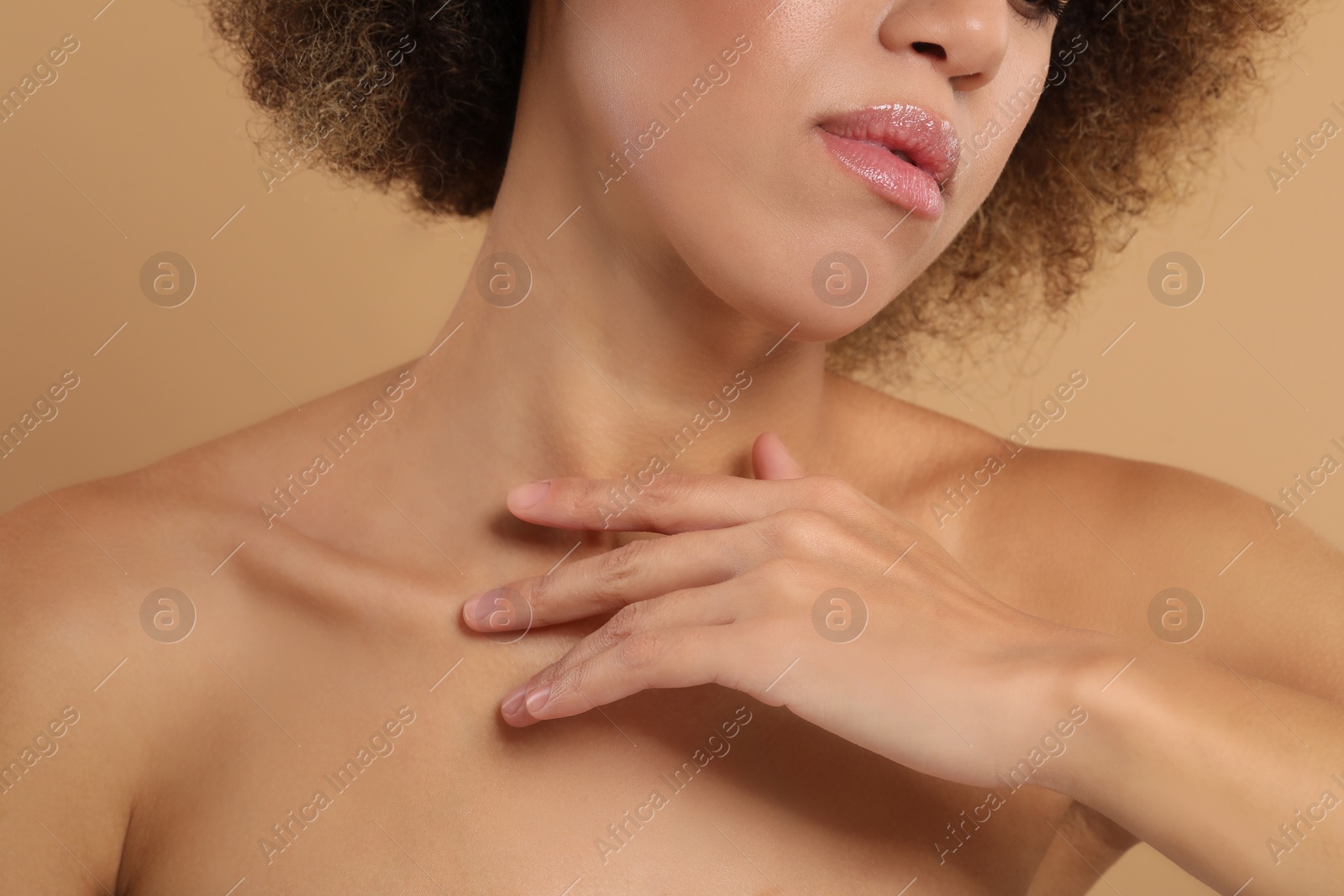 Photo of Beautiful woman with healthy skin on beige background, closeup