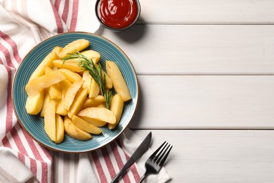 Photo of Plate with tasty baked potato wedges, rosemary and sauce on white wooden table, flat lay. Space for text