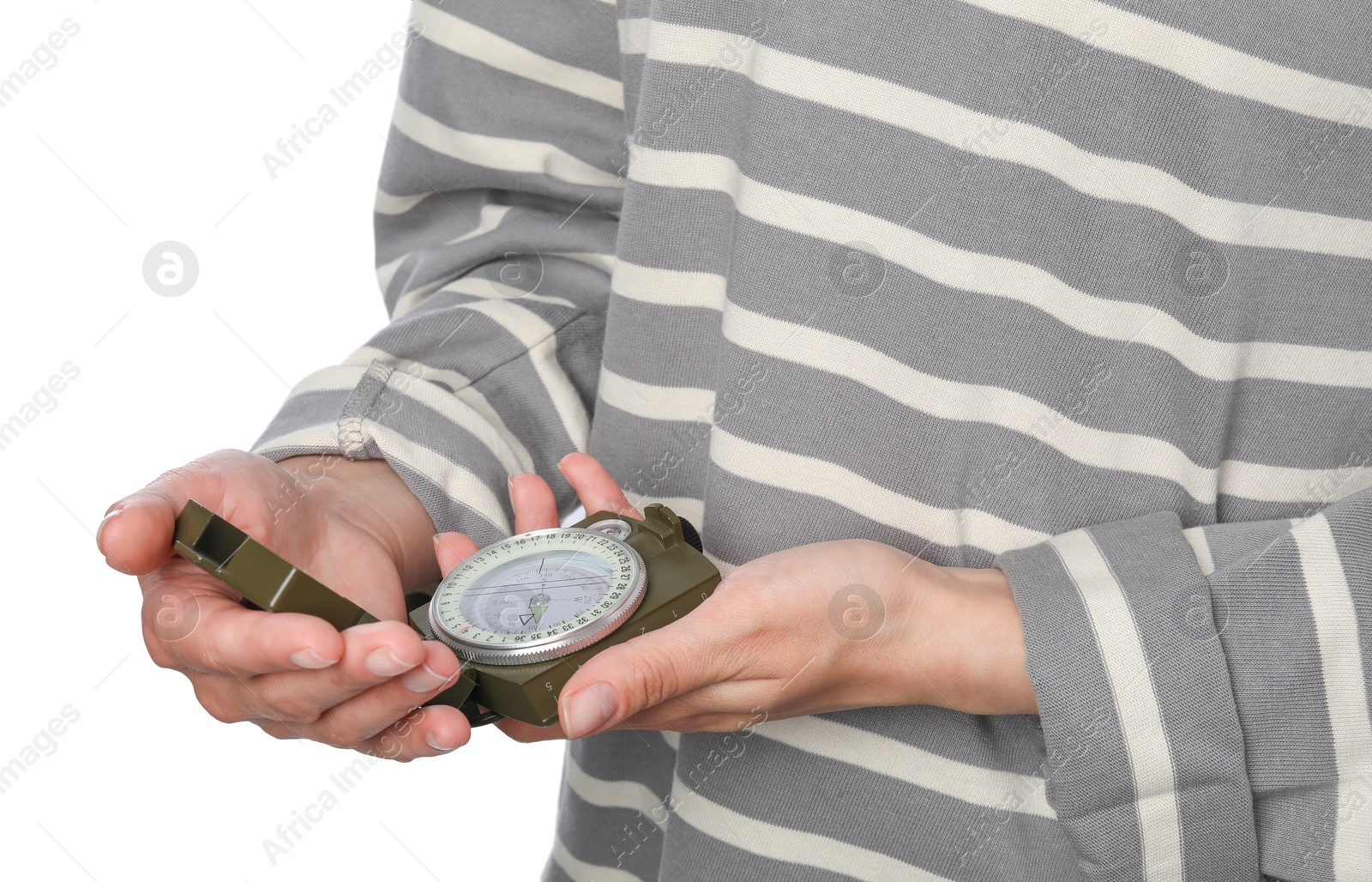 Photo of Woman holding compass on white background, closeup