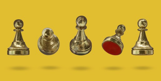 Image of Chess pawns in air on golden background, banner design