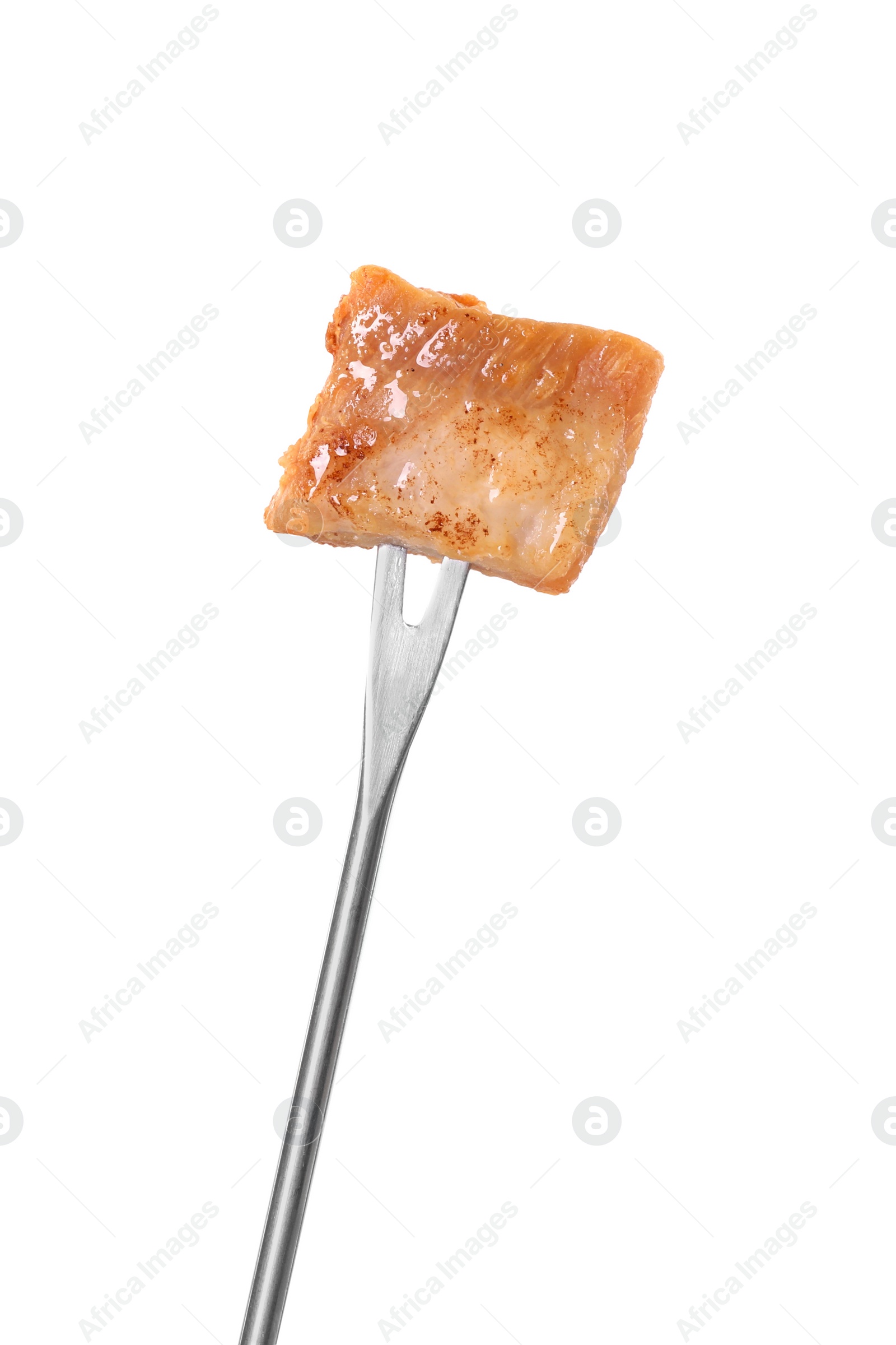 Photo of Fondue fork with piece of fried meat isolated on white